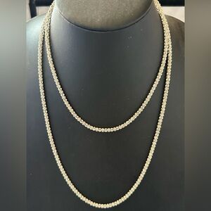 Anne Klein long silver tone rope chain with embedded clear rhinestones